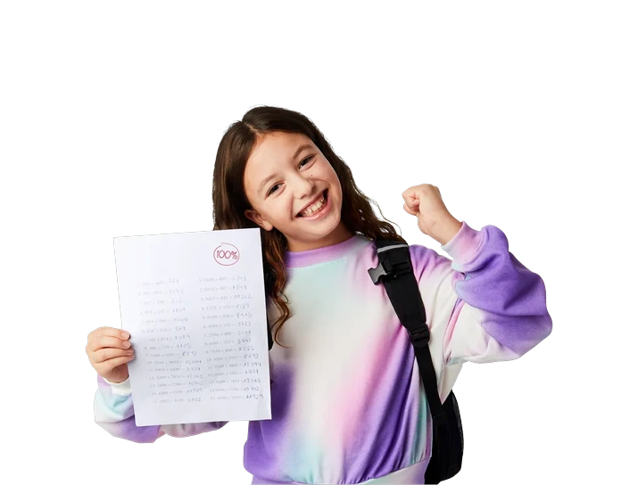 A happy student holding a graded test